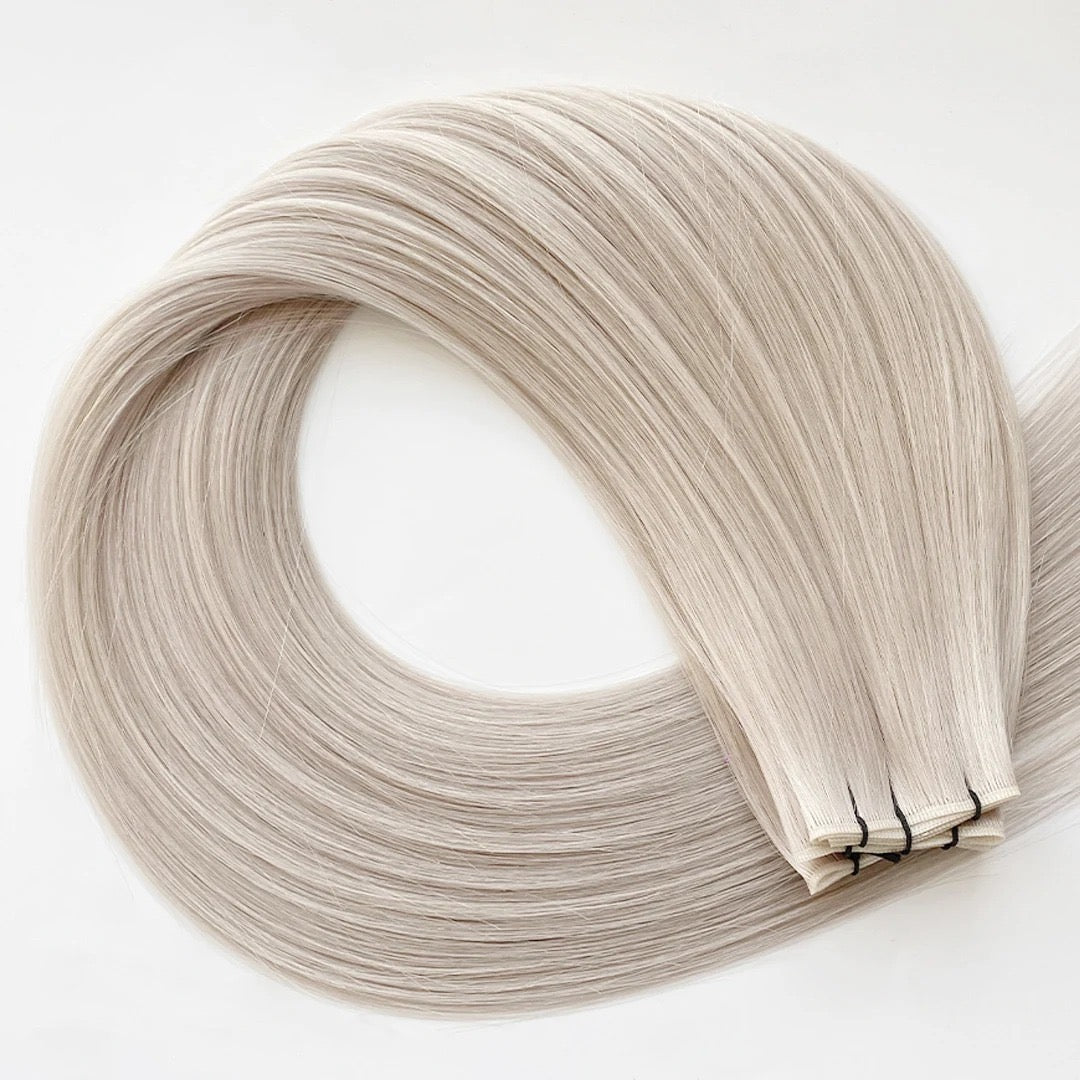 “Platinum blonde seamless weft hair extensions – Solace Seamless®”