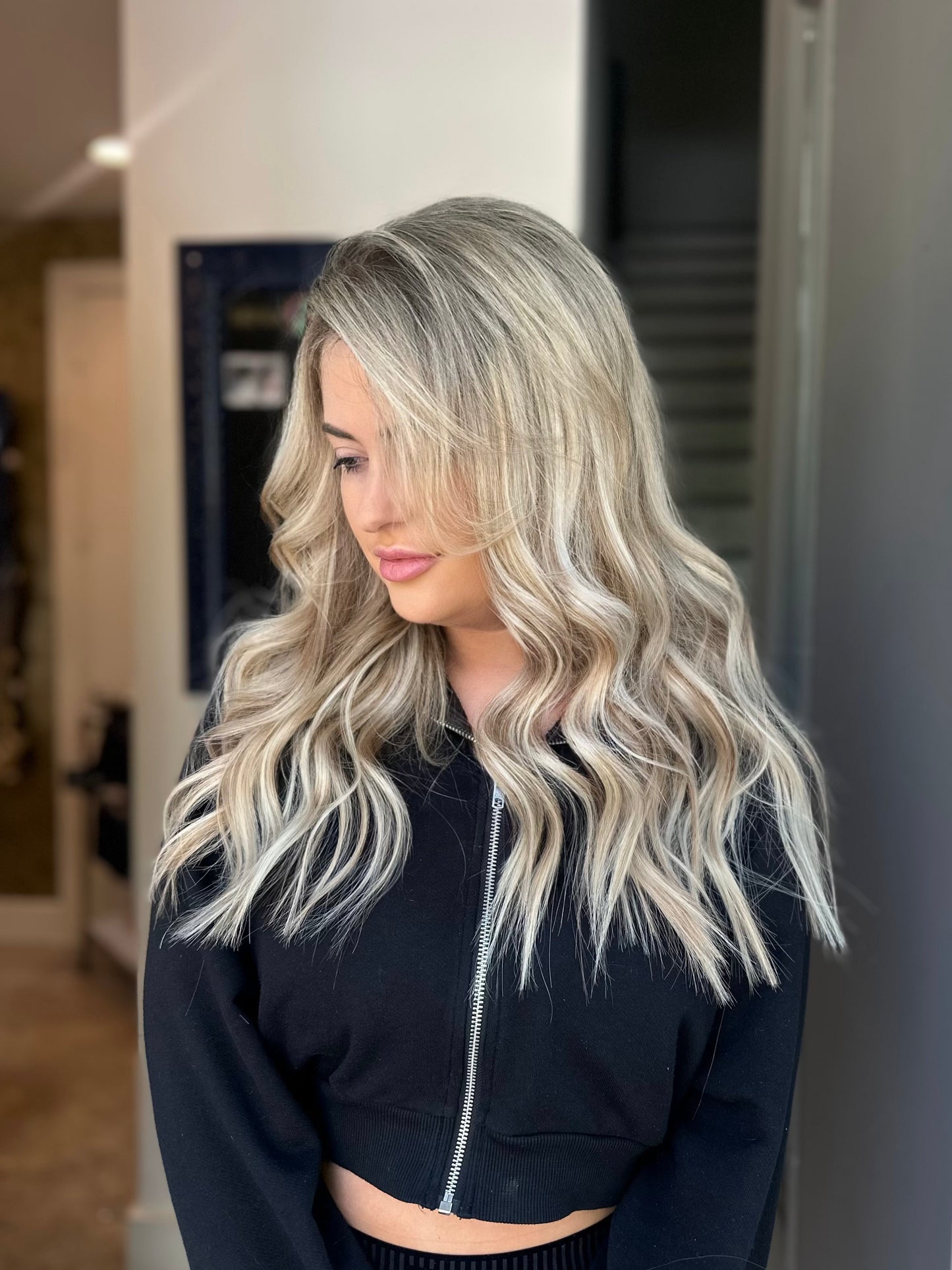 “Stylist hair transformation using seamless weft extensions for volume and length”