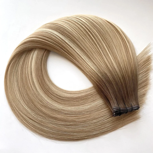 “Lived-in dimensional blonde seamless wefts – 100% human hair”
